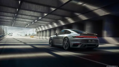 Porsche 911 Обои на телефон серебристый спортивный автомобиль на треке