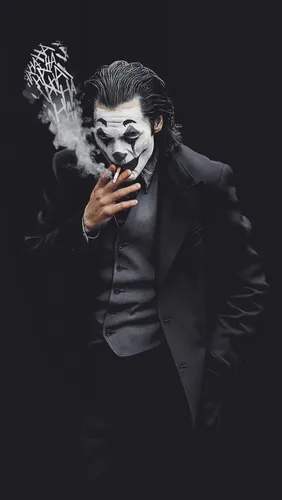 Джокер Hd Обои на телефон мужчина с сигаретой во рту и черепом на лице