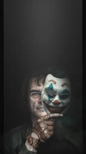 Джокер Hd Обои на телефон человек с маской на лице