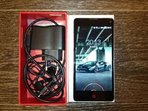 Леново А536 Обои на телефон черное прямоугольное устройство с экраном и проводами на деревянной поверхности