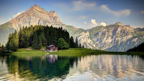 Швейцария Обои на телефон дом у озера с горами на заднем плане