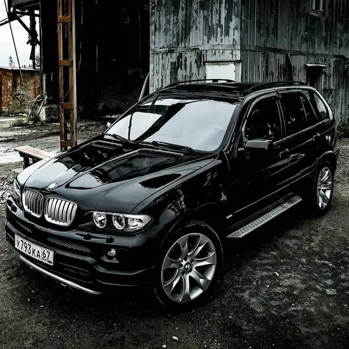 Bmw X5 E53 Обои на телефон черный автомобиль, припаркованный в гараже