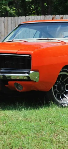 Dodge Charger 1969 Обои на телефон автомобиль, припаркованный на травянистой местности