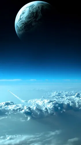 Космос Фото Обои на телефон планета над облаками