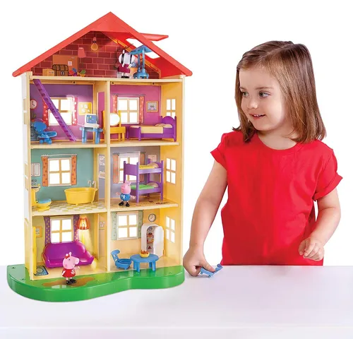 Дом Свинки Пеппы Картинки девушка стоит перед игрушечным домиком