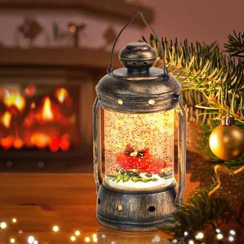 Картинка Новогодняя Картинки стеклянный фонарь с красно-желтой свечой перед камином