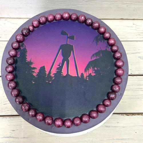 Сиреноголовый Фото фиолетовый торт с рисунком на нем