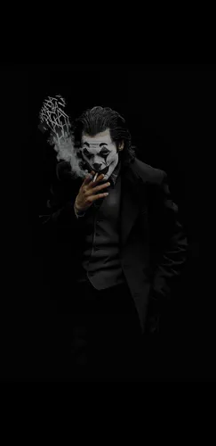 Джокер Картинки мужчина в маске курит сигарету