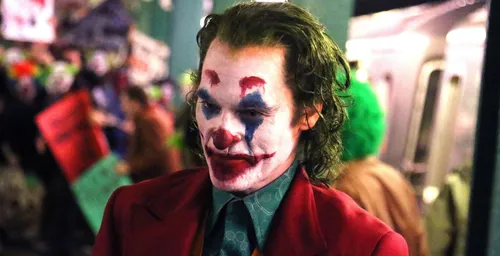 Джокера Картинки мужчина с красной краской на лице