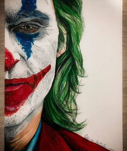 Джокера Картинки человек с зеленой и красной краской на лице