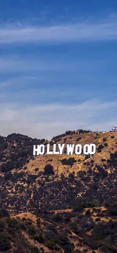 Hollywood Undead Обои на телефон человек, идущий по холму