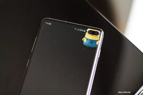 Samsung S10 Обои на телефон черное прямоугольное устройство с синей игрушкой