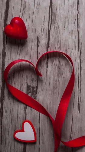 День Святого Валентина Обои на телефон красный знак в форме сердца