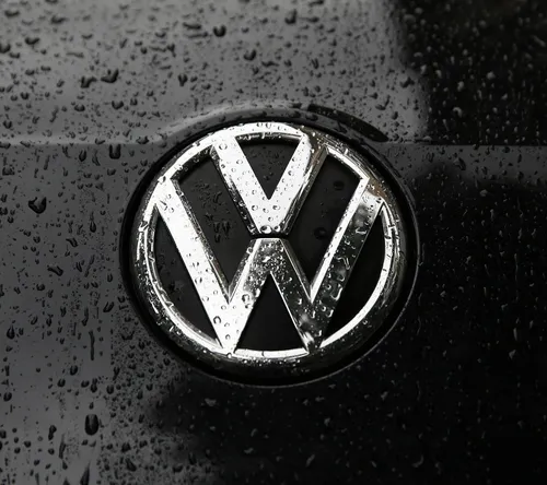 Фольксваген Обои на телефон логотип автомобиля крупным планом