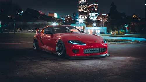 Супра Обои на телефон красный спортивный автомобиль, припаркованный ночью на улице