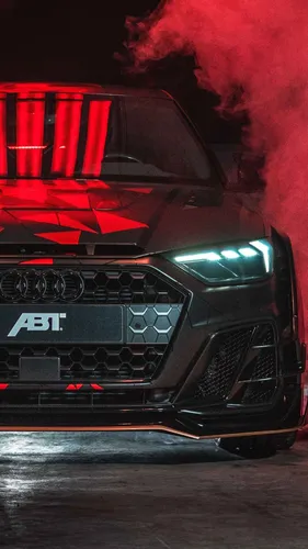 Audi Rs7 Обои на телефон задняя часть автомобиля с включенными огнями