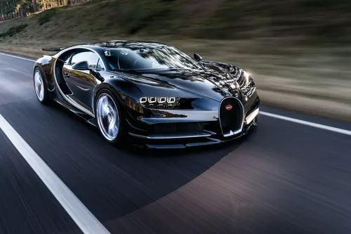 Bugatti Chiron Обои на телефон черный спортивный автомобиль на дороге