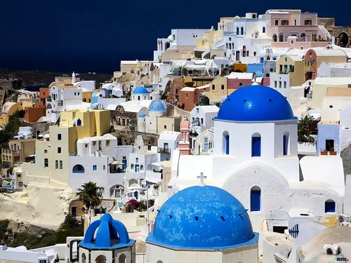 Греция Обои на телефон группа зданий с голубыми крышами