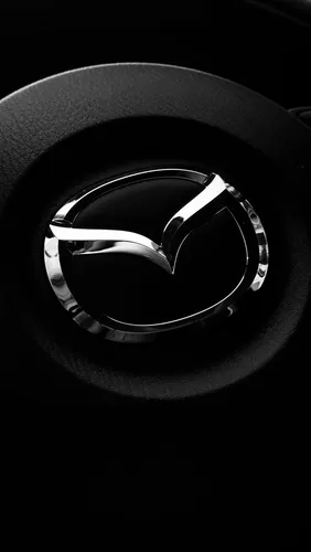 Мазда Обои на телефон логотип автомобиля крупным планом