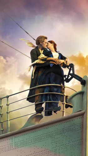 Титаник Обои на телефон мужчина и женщина целуются на металлической конструкции