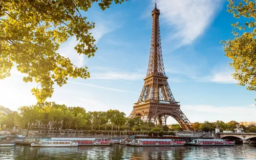 Франция Обои на телефон большая металлическая башня рядом с рекой