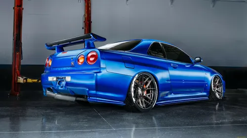 Nissan Skyline Обои на телефон синий спортивный автомобиль