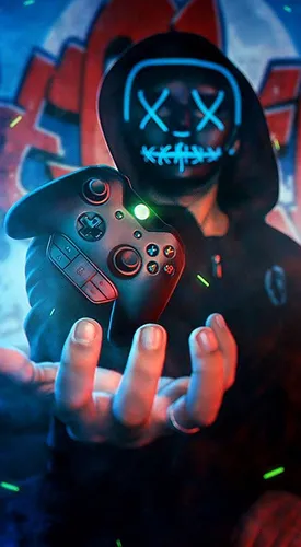 Xbox Обои на телефон человек, держащий контроллер видеоигр
