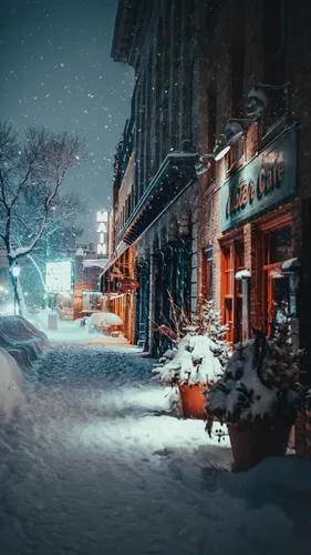 Бесплатные Зима Обои на телефон заснеженная улица со зданиями и деревьями
