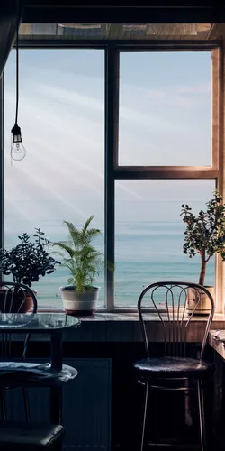 Красивые Дома Обои на телефон стол и стулья перед окном с видом на океан