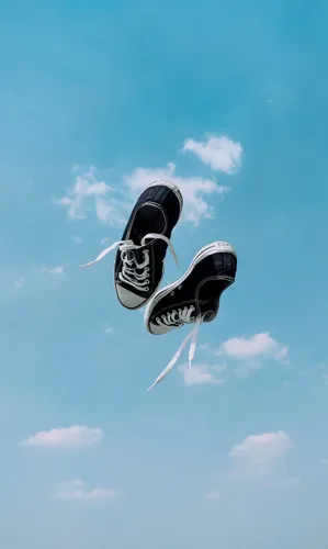 Reebok Обои на телефон пара туфель в воздухе