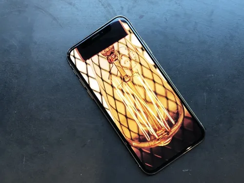 Айфон X Обои на телефон черно-золотая сумка