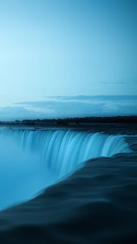 Волна Обои на телефон большой водопад с городом на заднем плане
