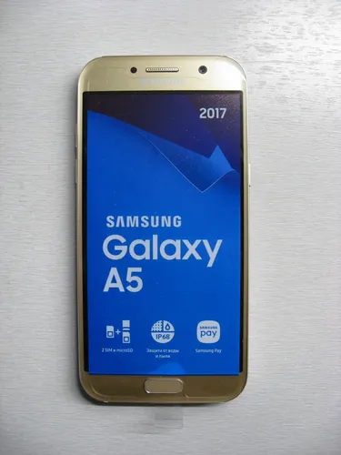 Самсунг А5 2017 Обои на телефон синее прямоугольное сотовое устройство