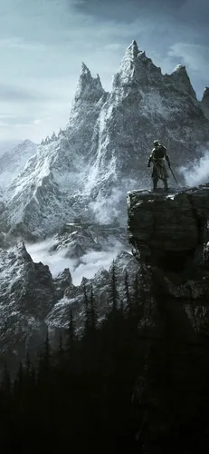 Скайрим Обои на телефон мужчина, стоящий на скале с горой на заднем плане