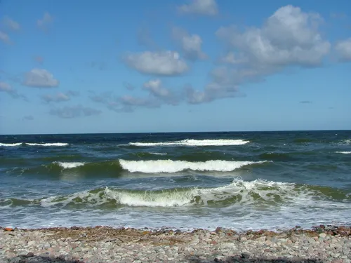 Моря Фото волны разбиваются на пляже