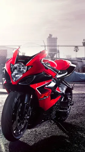 Мото Обои на телефон красный мотоцикл, припаркованный на улице