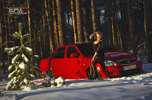 Бпан Обои на телефон человек, стоящий на красной машине в снегу