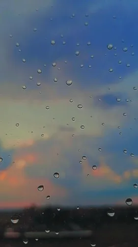 Атмосферные Обои на телефон окно с каплями дождя на нем